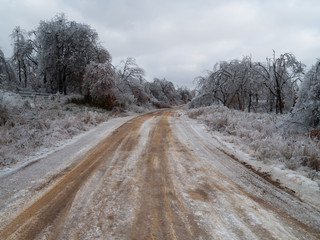 Obraz na płótnie Canvas Rural Country Road after a Powerful Ice Storm
