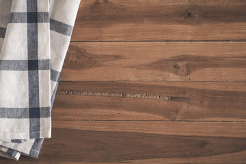 Top view of napkin on empty old wooden background