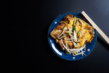 Thai style, turnip cake on black background