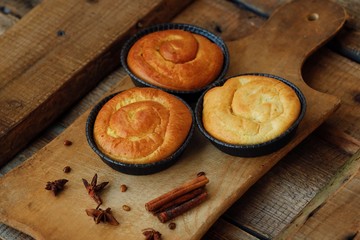 Delicious fresh cinnamon buns on the table