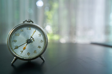 Alam clock, early in the morning with bokeh