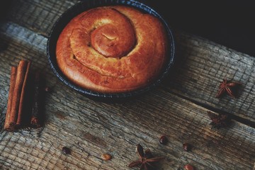 Delicious fresh cinnamon buns on the table