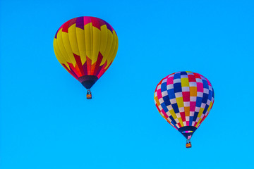 Two Multi Colored Hot Air Balloons