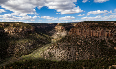 Fototapeta na wymiar Shadows Moving Across Deep Canyons in Mesa Verde National Park, Colorado