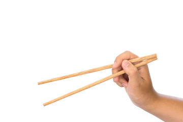 Naklejka premium hand holding Wooden chopsticks isolated on white background