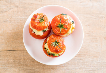  baked tomatoes stuffed with cheese and spinach
