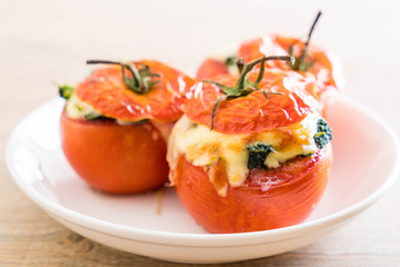  baked tomatoes stuffed with cheese and spinach