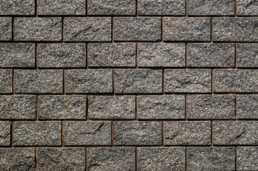 Abstract grey brick wall pattern background, rough solid texture and grunge surface backdrop for architecture material decoration or retro interior room concepts