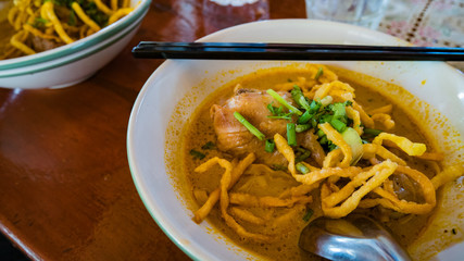Egg Noodle in Chicken Curry or Kao Soi Kai Local food in the North of the country, Thailand.