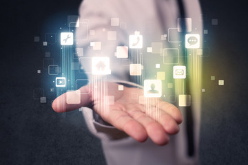 Businessman holding blue applications