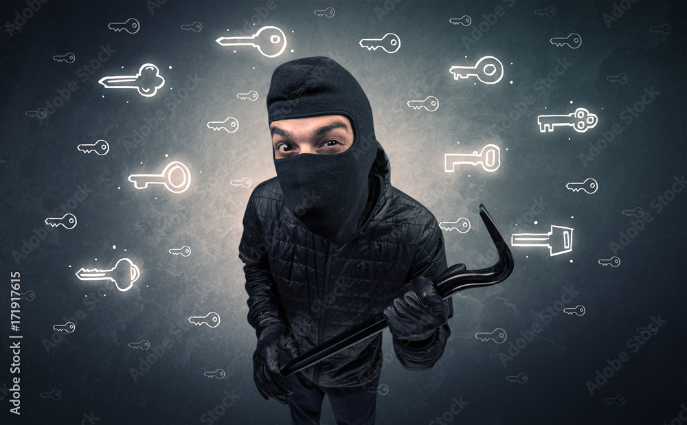 Wall mural Burglar holding tool.