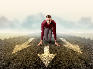 Businessman kneeling in ready position