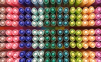 The bright color of the lid Magic pen layered into a rainbow, colorful pen,wallpaper,pattern,abstract background.Image overla