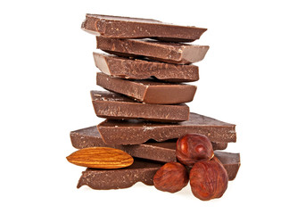 Milk chocolate with hazelnuts and almonds on a white background
