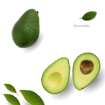Creative layout of avocado and leaves on white background. Whole and half avocado with leaves.Food concept.