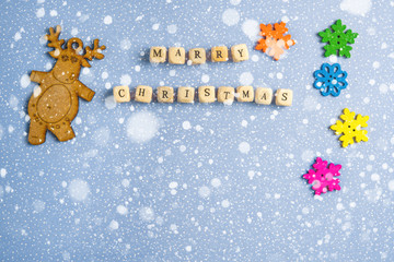 Christmas card Inscription Merry Christmas on the background of snow and decor