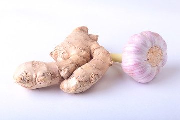 fresh ginger and garlic isolated on white background.