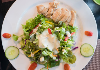 Fresh salad and mix vegetable in White plate .