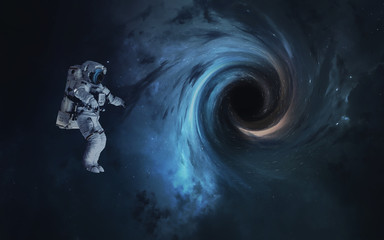 Black hole and astronaut. Abstract space wallpaper. Universe filled with stars, nebulas, galaxies...