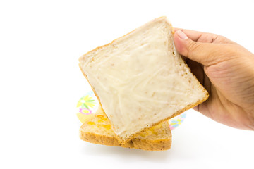 Slide bread with mayonnaise in the man hand