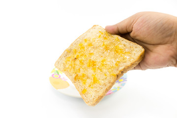 slide bread with orange yam in the man hand