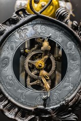 Fototapeta na wymiar Old clock closeup made out of steel