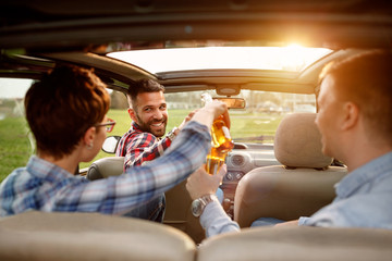 Friends enjoying time together on road trip.