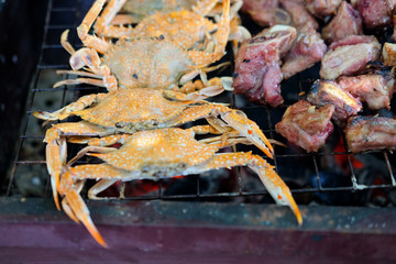 Pork rib and crab on grill are very fragrant