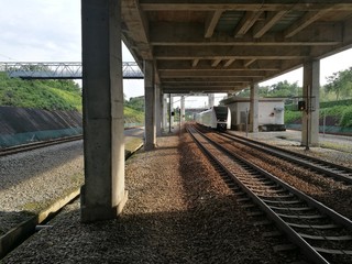 Fototapeta na wymiar railroad with train coming