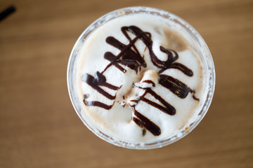 Whipped cream in takeaway cup view from the top