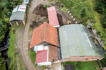 Aerial view of a construction site for the renovation of an old factory from the 19th century