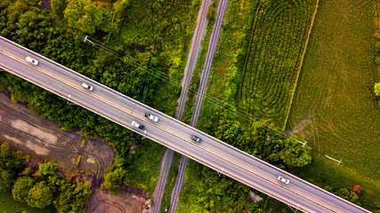 Aerial Photo Countryside Car Running on Road Bridge Over Railway Bypass route the City Drone Top...