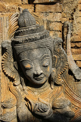 Fototapeta na wymiar The figure of the stone in the ruins Shwe Inn Dain Pagoda, Indein,Myanmar (Burma)