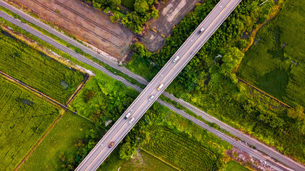 Aerial Photo Countryside Car Running on Road Bridge Over Railway Bypass route the City Drone Top View