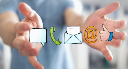 Businessman holding manuscript contact icon in his hand