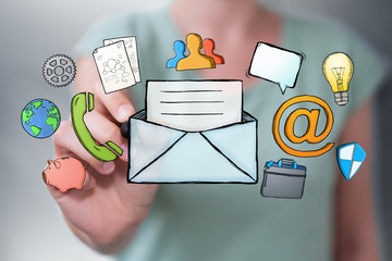 Businesswoman drawing manuscript contact icon with a pen