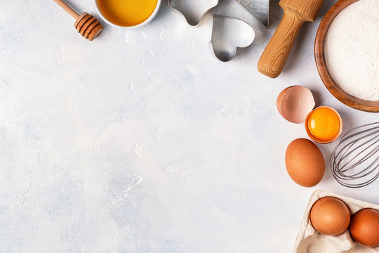 Ingredients For Baking  - Flour, Wooden Spoon, Eggs.