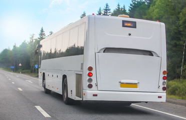 tourist bus goes on highway © Yuri Bizgaimer