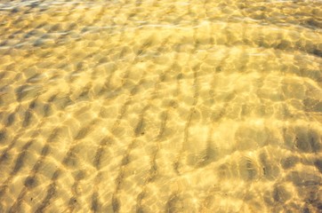 Fototapeta na wymiar Sand pattern on the shallow sea bottom, Baltic sea coast