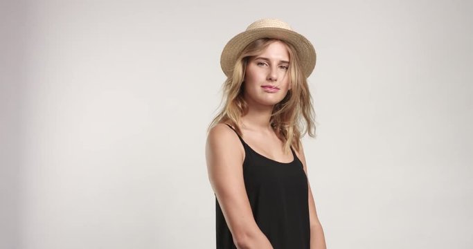 Pretty blond girl in straw hat video