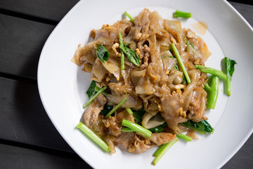 Fired thin noodles in sweet soy sauce with pork