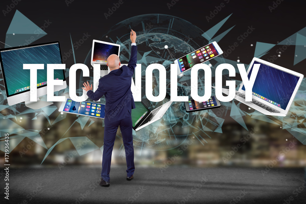Poster view of a businessman in front of a wall with technology title surounded by device like smartphone, 
