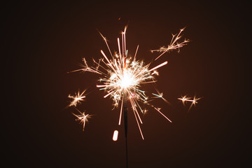 Sparkler firework light glowing in the dark, for celebration and birthday 