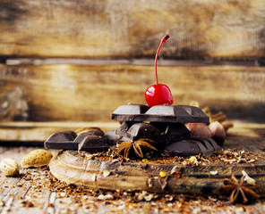 pieces of chocolate with nuts and cinnamon