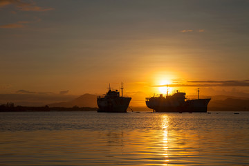 big transport boats in the morning sunrise.