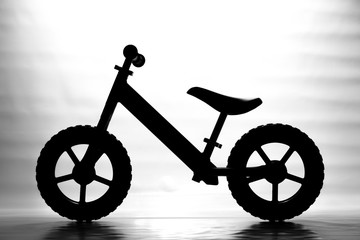 silhouette of balance bike