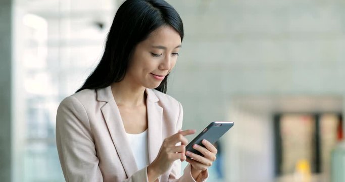 Business woman using cellphone