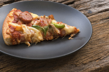 A piece of delicious pizza