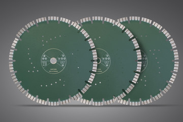 Cutting disks with diamonds - Diamond discs for concrete isolated on the gray background