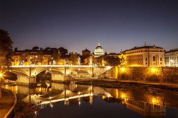 Fototapeta na wymiar The night view of Rome from the Ponte Sant'angelo, Italy